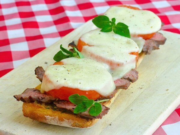 http://www.nobiggie.net/wp-content/uploads/2016/02/Tomato-Provolone-Steak-Sandwich-25-leftover-steak-recipes.jpg