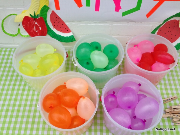 neon colored water balloons for a fruit ninja party | NoBiggie.net