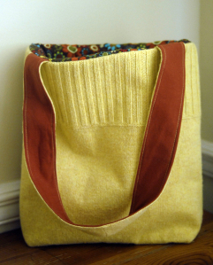 Yellow sweater turns into a bag (with pockets)