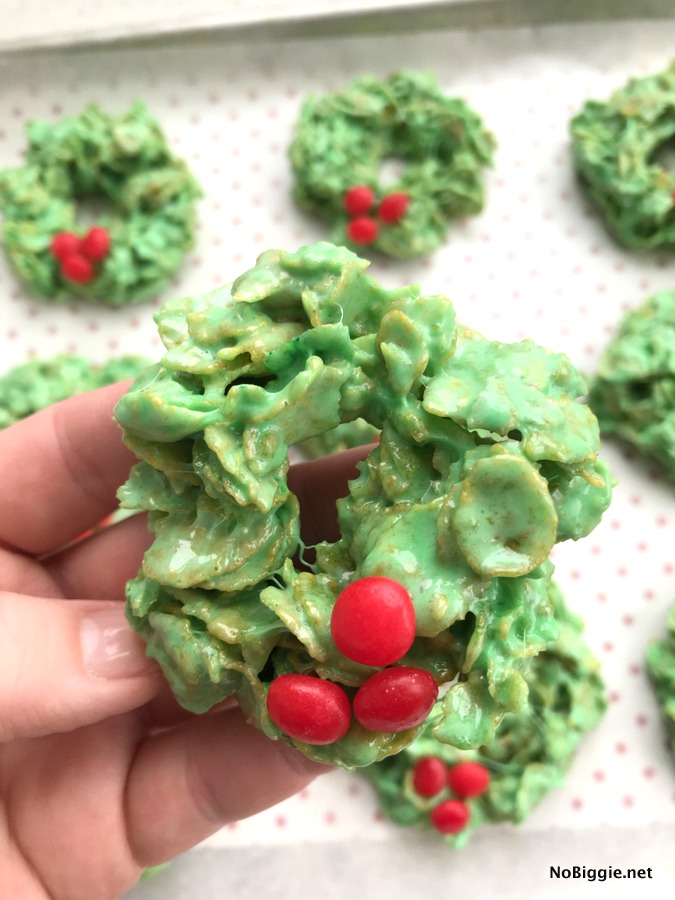 cornflake wreath cookies in hand
