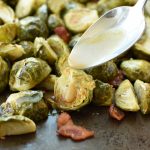 roasted Brussels Sprouts with a warm bacon honey dijon sauce