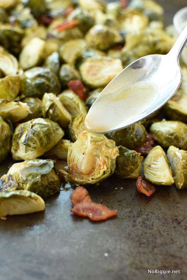 roasted Brussels Sprouts with a warm bacon honey dijon sauce
