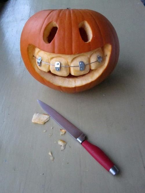 Smiley Braces Carved Pumpkin | 25+ Creative Carved Pumpkins