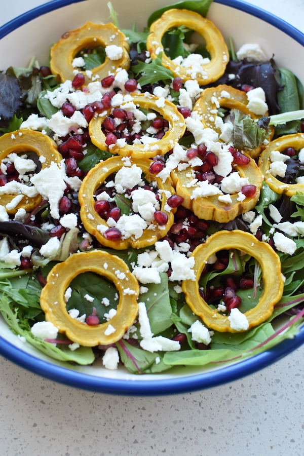 delicata squash salad with pomegranate and goat cheese